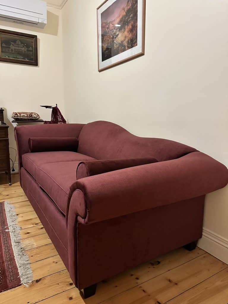 Three-quarter view of Meredith sofa bed after careful placement (right side)