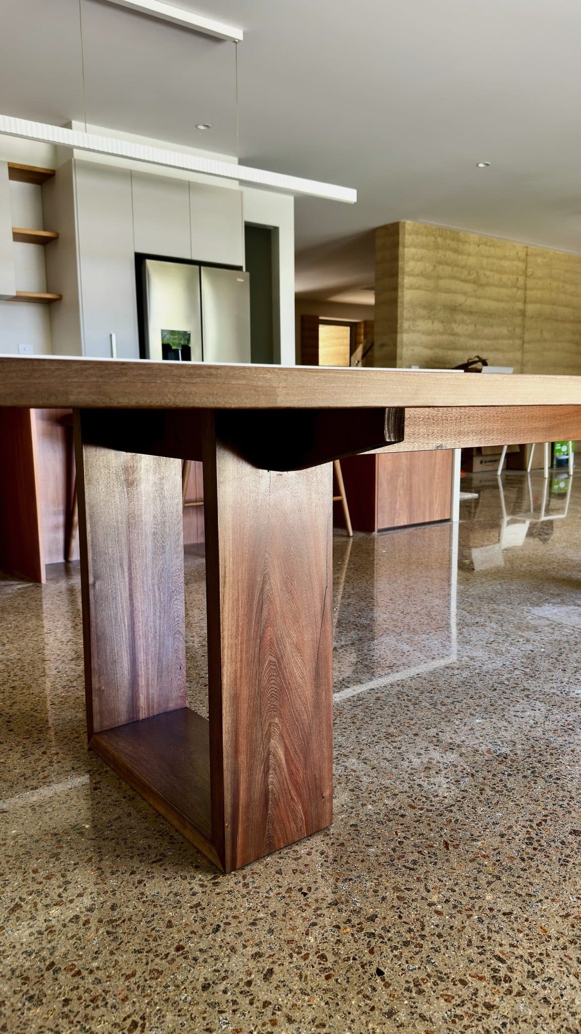 Christian Cole dining table pedestal base detail in the finished room.