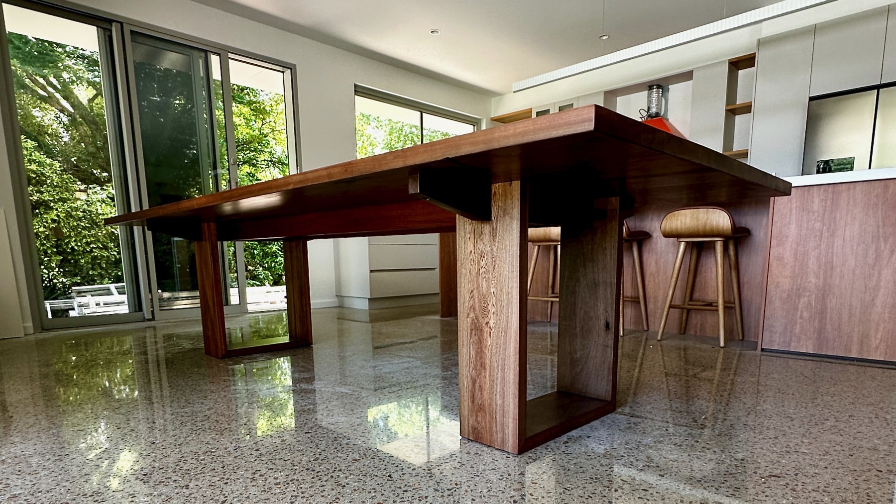timber dining table base and leg detail from a second angle.