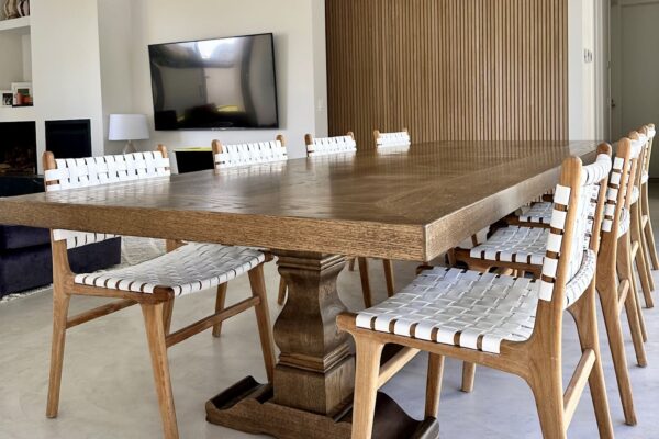 Angled view of a Christian Cole dining table in a modern interior