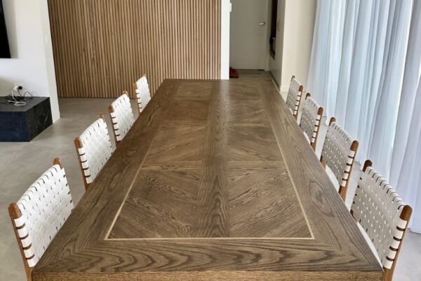 Front view of a Christian Cole dining table and chairs in Beaumaris, VIC