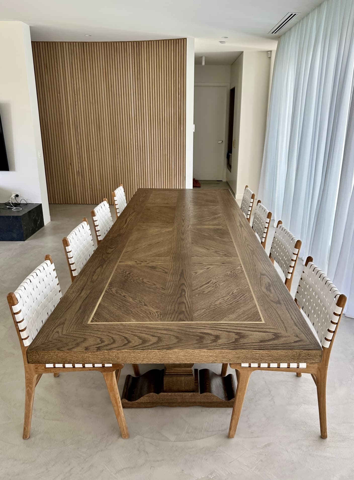 Front view of a Christian Cole dining table and chairs in Beaumaris, VIC