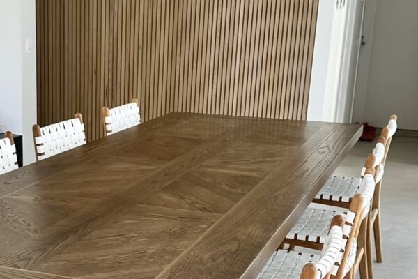 Christian Cole dining table in a bright Melbourne dining room