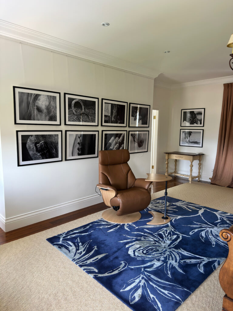 Full-room view of a Strictly Comfort recliner delivery in a finished bedroom