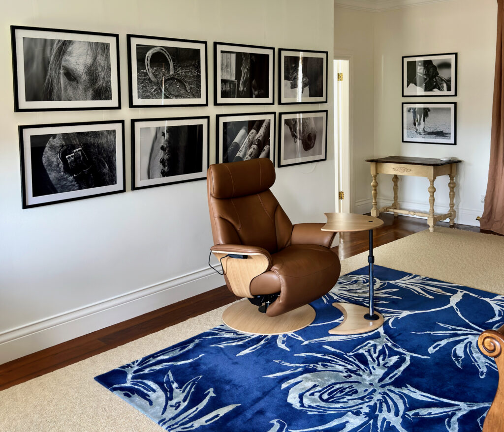 Strictly Comfort leather recliner carefully placed in a finished bedroom
