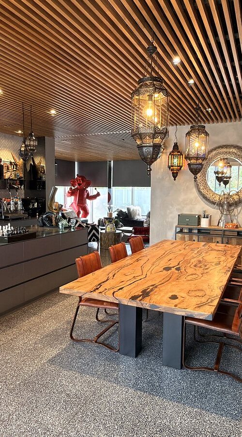 Live-edge timber dining table placed in a Balwyn North home in September 2026