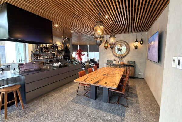 Live-edge timber dining table placed in a Balwyn North home in September 2026