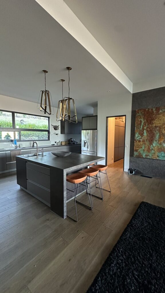 Side view of bar stools positioned around a Bonnie Doon kitchen island