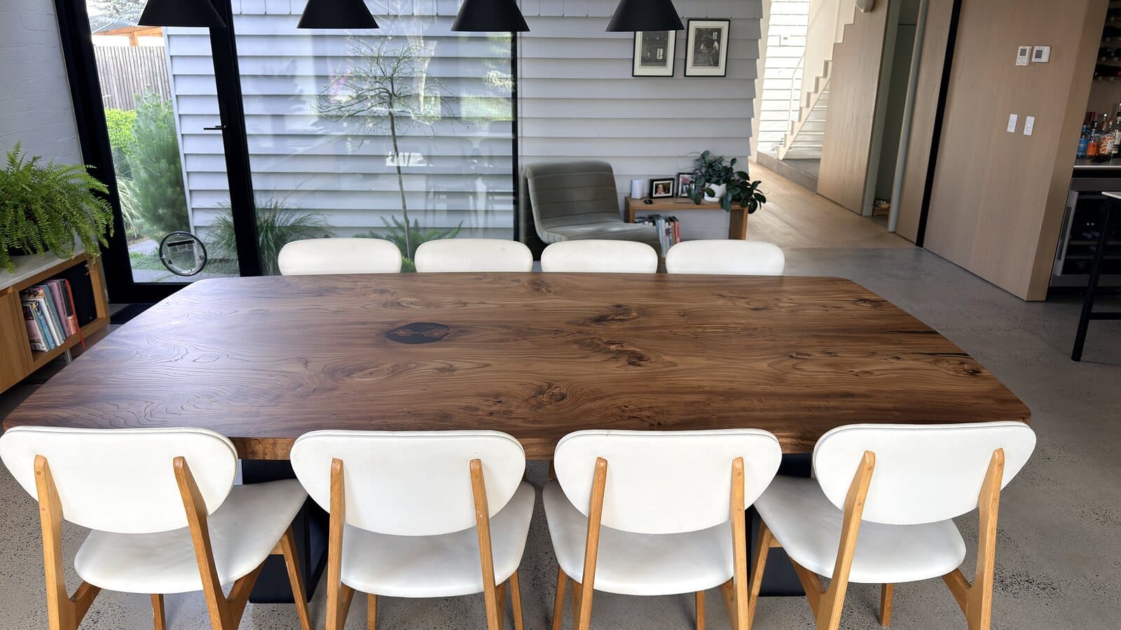 Organic-edge timber dining table delivered to Northcote in September 2026