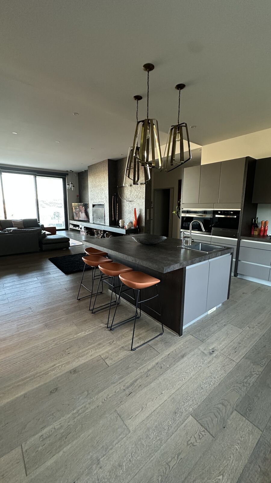 Open-plan Bonnie Doon kitchen with Voyager Interiors bar stools