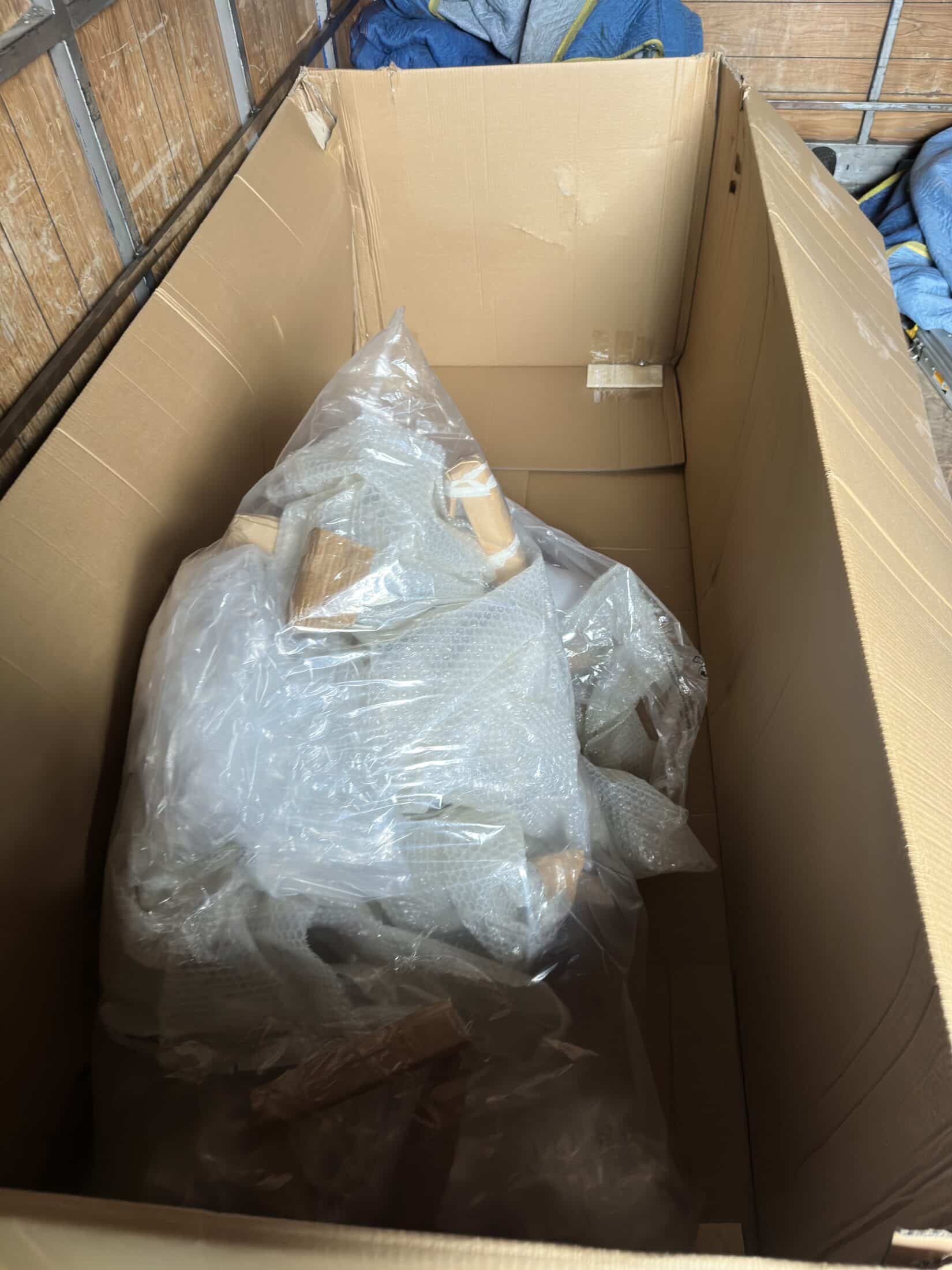 Protective packaging collected after the outdoor furniture was unpacked and placed.