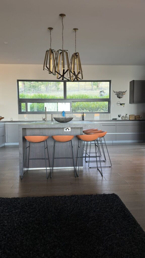 Front view of tan bar stools in a Bonnie Doon kitchen